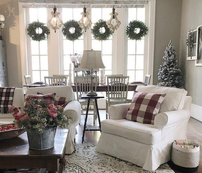 Family Livingroom in a home during the hoidays decorated with winter accents