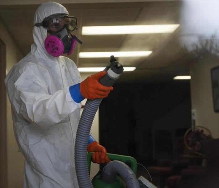 A SERVPRO technician fogging a commercial property with CDC certified product to destroy viral pathogens. 
